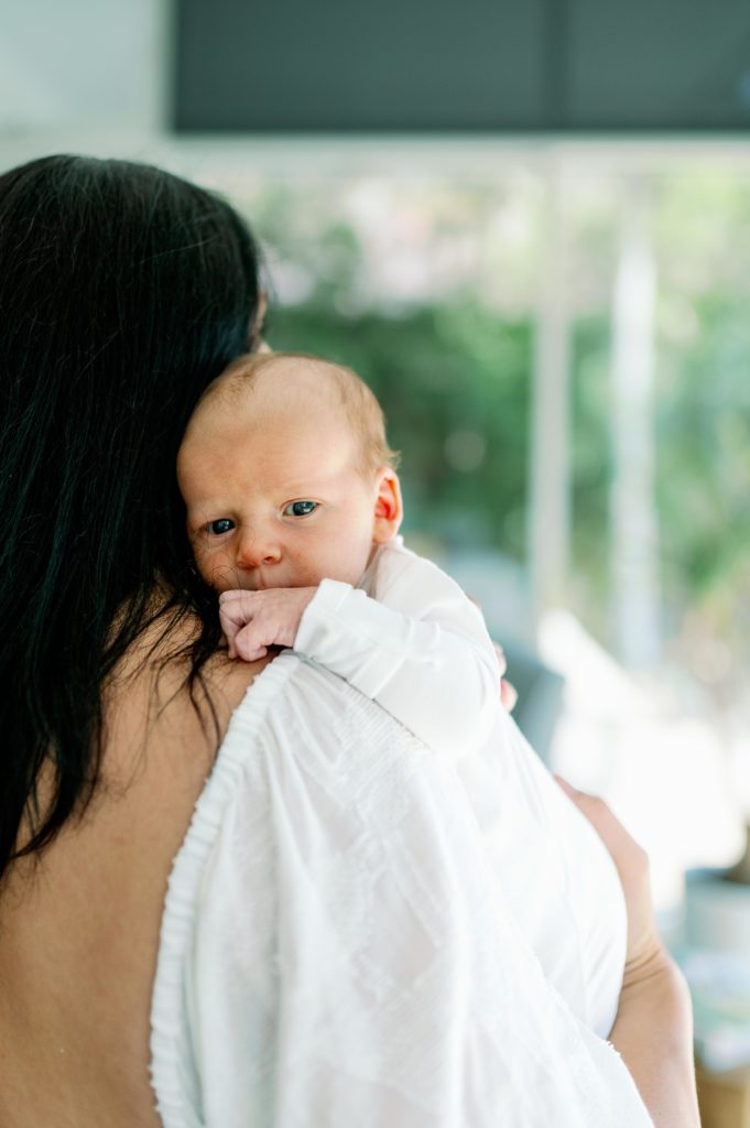mom and newborn in Fort Worth family newborn photography home session