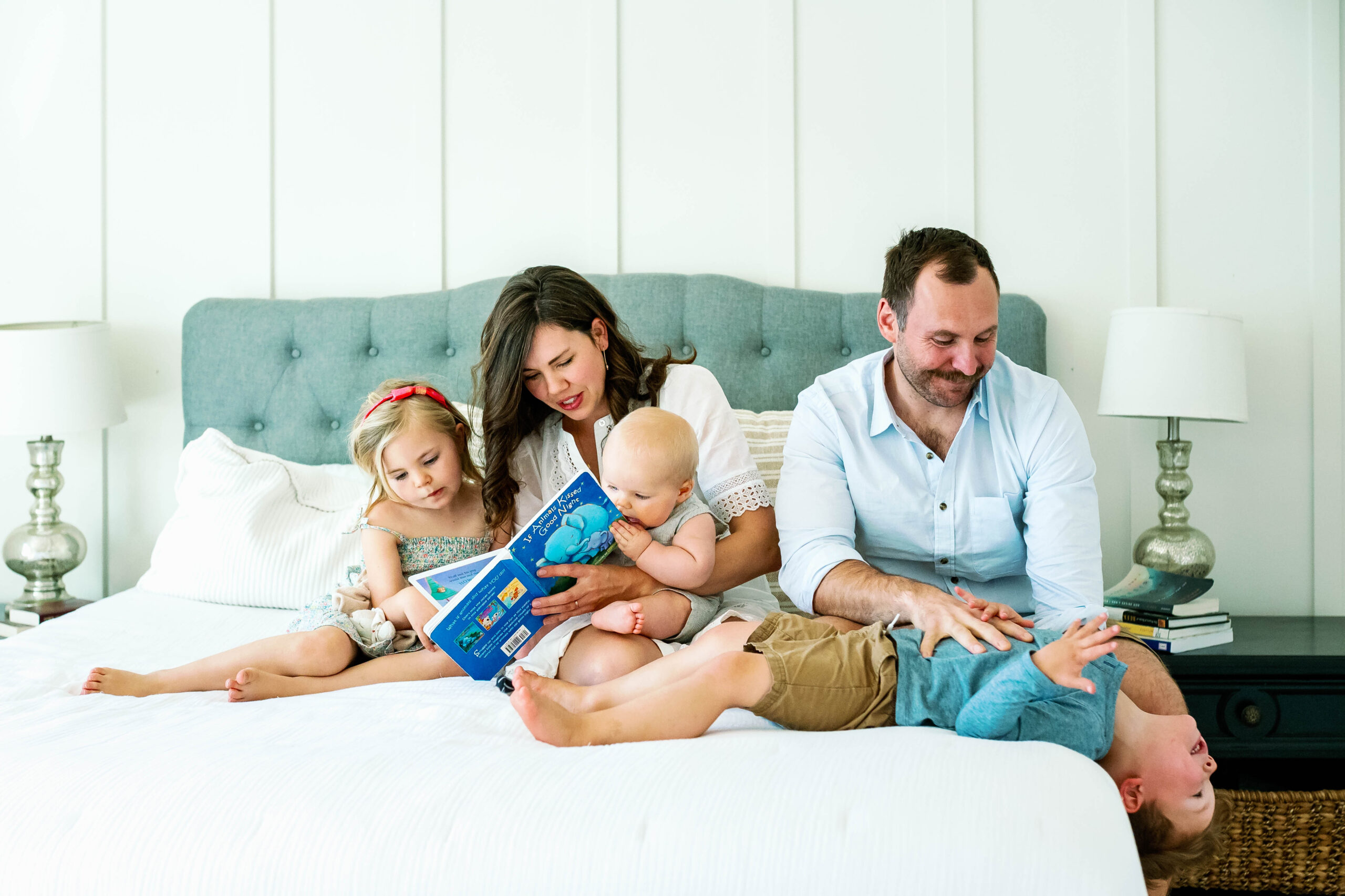 family reading a book together