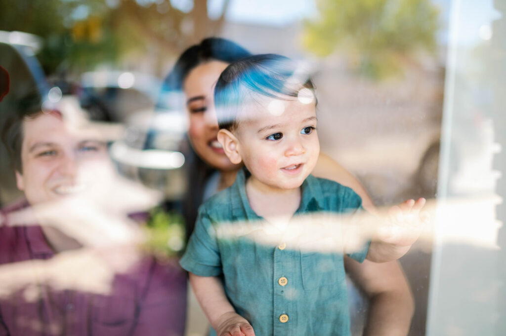 toddler gazing out window