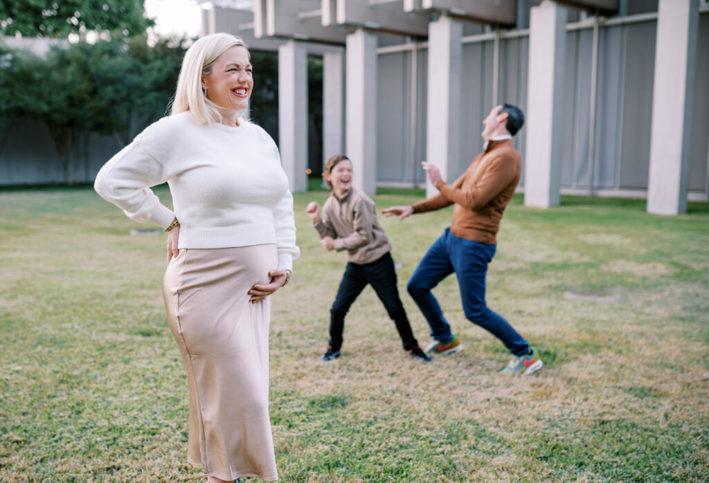 A playful time during a maternity photo session in Fort Worth TX.