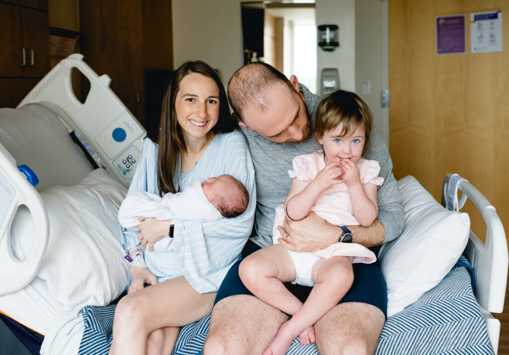 Fresh 48 session — full family in hospital room, Fort Worth newborn photographer.