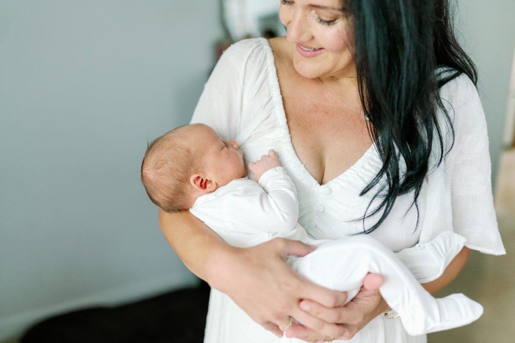 mom and newborn in Fort Worth family in home photography session
