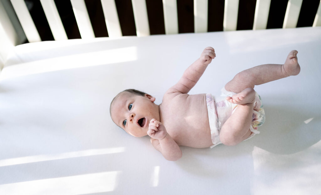 newborn in crib fort worth area photo session