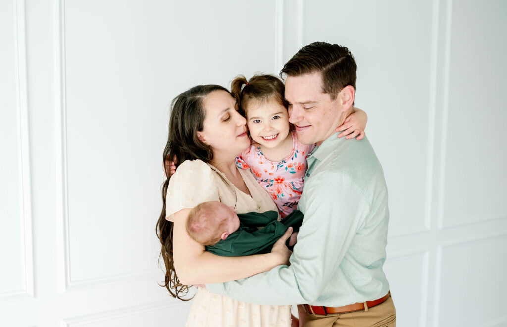 big family hug newborn session Allison Krogness Photography